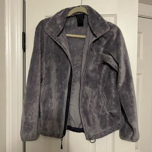 Grey The North Face fleece zip up jacket.